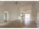 Spacious open-concept living space with light wood floors, white walls, recessed lighting, and modern fixtures at 104 Willow Ridge Rd., Myrtle Beach, SC 29588