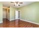 Bedroom with hardwood floors and ceiling fan at 107 Maddux Ln. # E, Myrtle Beach, SC 29588
