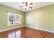 Bedroom with hardwood floors and ceiling fan at 107 Maddux Ln. # E, Myrtle Beach, SC 29588