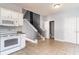 Kitchen with white cabinets and stairs at 107 Maddux Ln. # E, Myrtle Beach, SC 29588