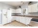 Kitchen with white cabinets and appliances at 107 Maddux Ln. # E, Myrtle Beach, SC 29588
