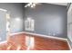 Living room with hardwood floors and high ceiling at 107 Maddux Ln. # E, Myrtle Beach, SC 29588