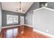 Spacious living room with hardwood floors and high ceilings at 107 Maddux Ln. # E, Myrtle Beach, SC 29588