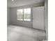Cozy bedroom with a large window offering plenty of natural light and plush carpeting at 1080 Oak Meadow Dr., Conway, SC 29526