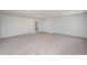 Large bedroom features plush carpeting and a nearby doorway, perfect for relaxation and comfort at 1119 Black Lake Way, Conway, SC 29526