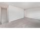Carpeted loft space with a staircase and neutral color scheme, perfect for relaxation at 1119 Black Lake Way, Conway, SC 29526