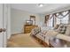 Main bedroom with TV, dresser, and plaid bedding at 1240 Pineridge St., Conway, SC 29527