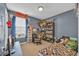 This bedroom has carpet flooring, a desk, a gaming chair and plenty of space at 1240 Pineridge St., Conway, SC 29527