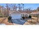 A beautiful one-story home with a two-car garage and a well-manicured lawn at 1240 Pineridge St., Conway, SC 29527