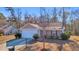 Charming home with a two-car garage and well-maintained lawn surrounded by mature trees at 1240 Pineridge St., Conway, SC 29527