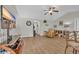 Spacious living room features hardwood floors, ceiling fan and doorway access to the entry hall at 1240 Pineridge St., Conway, SC 29527