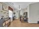 Functional home office with hardwood floors and a large desk, perfect for remote work or study at 1240 Pineridge St., Conway, SC 29527