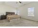 Bright bedroom featuring a king-size bed and large window at 129 Yeomans Dr., Conway, SC 29526