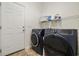 Laundry room with washer, dryer, and ample shelving at 129 Yeomans Dr., Conway, SC 29526