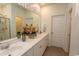 Elegant bathroom with double vanity, large mirror, and a walk-in shower at 136 Timber Oaks Dr., Myrtle Beach, SC 29588