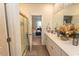 Modern bathroom with double vanity, walk-in shower, and access to bedroom at 136 Timber Oaks Dr., Myrtle Beach, SC 29588
