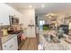 Granite kitchen island and stainless steel appliances at 136 Timber Oaks Dr., Myrtle Beach, SC 29588