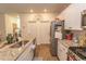 White kitchen cabinets and granite countertops at 136 Timber Oaks Dr., Myrtle Beach, SC 29588