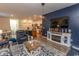 Spacious living area with a fireplace and open kitchen view at 136 Timber Oaks Dr., Myrtle Beach, SC 29588