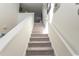Carpeted staircase leading to the upper level of the home at 136 Timber Oaks Dr., Myrtle Beach, SC 29588