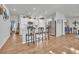 Open concept kitchen with island seating and stainless steel appliances at 144 Rutland Ct., Conway, SC 29526