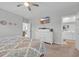 Main bedroom with king bed, dresser, and access to bathroom at 144 Rutland Ct., Conway, SC 29526