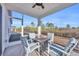 Relaxing screened porch with fire pit and seating at 144 Rutland Ct., Conway, SC 29526