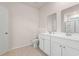 Bathroom with double vanity and shower at 144 Vineyard Place # 144, Pawleys Island, SC 29585