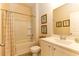 Clean bathroom with tub shower and coastal decor at 1443 Porchfield Dr., Conway, SC 29526