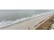 Wide aerial view of beach and ocean at 1501 S Ocean Blvd. # 1542, Myrtle Beach, SC 29577