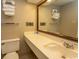 Bathroom featuring a sink and large mirror at 1501 S Ocean Blvd. # 1542, Myrtle Beach, SC 29577