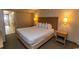 Double bed and nightstand in a comfortable condo bedroom at 1501 S Ocean Blvd. # 1542, Myrtle Beach, SC 29577