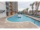 Large, lagoon-style outdoor pool with a fountain at 1501 S Ocean Blvd. # 1542, Myrtle Beach, SC 29577