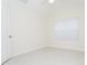 Bright bedroom with neutral walls, a window with cellular shades, and tile flooring at 160 Stonegate Blvd. # 160, Murrells Inlet, SC 29576