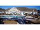 Enjoy the sunshine by the pool at the clubhouse featuring a spacious deck and lounge chairs at 160 Stonegate Blvd. # 160, Murrells Inlet, SC 29576
