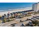 Aerial view showcasing colorful beach homes, oceanfront location, and proximity to the beach at 2022 N Waccamaw Dr., Garden City Beach, SC 29576