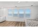 Bright main bedroom with ocean views and plenty of natural light at 2022 N Waccamaw Dr., Garden City Beach, SC 29576