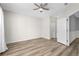 Spacious bedroom with ceiling fan and hardwood floors at 209 Wando River Rd. # 10C, Myrtle Beach, SC 29579