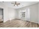 Bright bedroom with ceiling fan and hardwood floors at 209 Wando River Rd. # 10C, Myrtle Beach, SC 29579