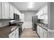 Modern kitchen with stainless steel appliances and white cabinets at 209 Wando River Rd. # 10C, Myrtle Beach, SC 29579