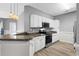 Modern kitchen with stainless steel appliances and an island at 209 Wando River Rd. # 10C, Myrtle Beach, SC 29579