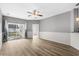 Spacious living room featuring hardwood floors and sliding glass doors at 209 Wando River Rd. # 10C, Myrtle Beach, SC 29579