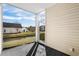 Screened porch with view of backyard and water at 209 Wando River Rd. # 10C, Myrtle Beach, SC 29579