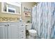 Clean bathroom with a shower/tub combo and updated vanity at 2225 Essex Dr. # F, Surfside Beach, SC 29575
