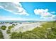 Expansive beach view with ocean and umbrellas at 2225 Essex Dr. # F, Surfside Beach, SC 29575