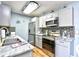 Modern kitchen with stainless steel appliances and granite countertops at 2225 Essex Dr. # F, Surfside Beach, SC 29575
