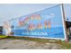 Large mural depicting the name of the town at 2225 Essex Dr. # F, Surfside Beach, SC 29575