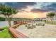Community waterfront patio with seating and sunset views at 2225 Essex Dr. # F, Surfside Beach, SC 29575