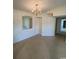 Bright dining area with chandelier and mirrored wall at 2276 Essex Dr. # K, Surfside Beach, SC 29575