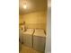Laundry room with washer, dryer, and shelving at 2276 Essex Dr. # K, Surfside Beach, SC 29575